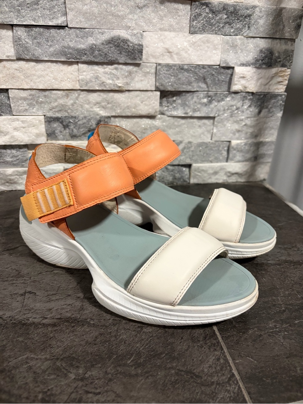 Sorel Women's Explorer Blitz Stride Sandals in the Paradiso Peach/Sea Salt